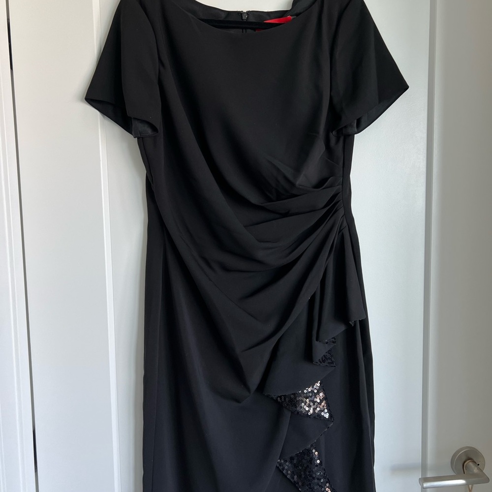 Black dress w/sequin ruffle detail on side. SZ 16, Carmen Marc Valvo (Infusion).